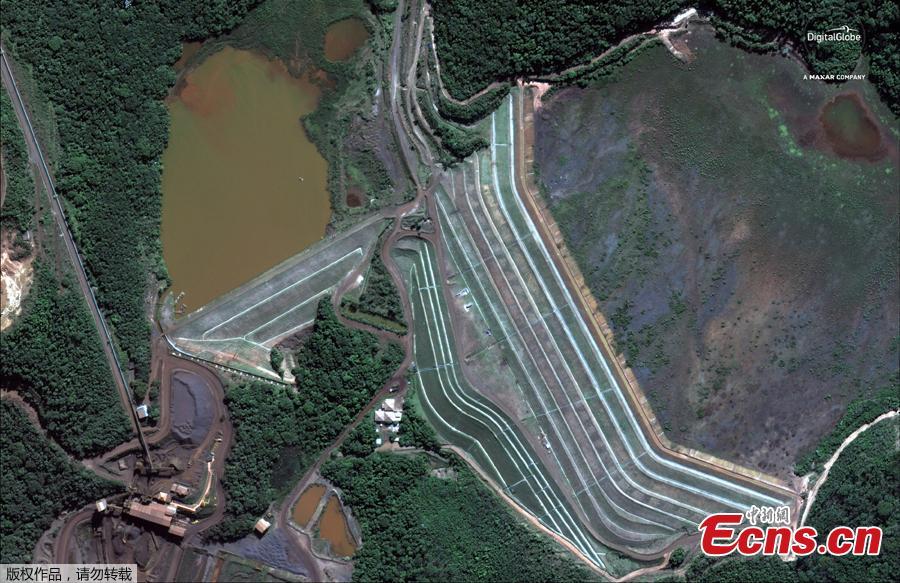 The dam at Vale\'s Corrego do Feijao mine near Brumadinho, Brazil, is pictured before its January 25, 2019 collapse in this June 2, 2018 handout satellite photo obtained by Reuters January 27, 2019.(Photo/Agencies)