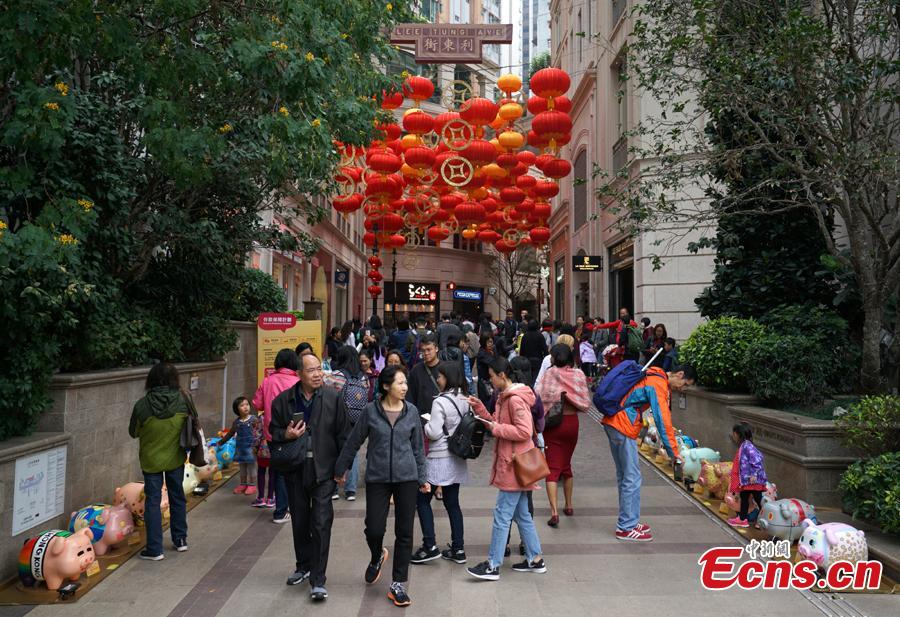 A piglet-themed art installment to promote the importance of saving money has been organized by the Hong Kong Deposit Protection Board and appears in an exhibition on Lee Tung Street in Hong Kong, Jan. 27, 2019. Hong Kong students and local artists designed 66 piglets for the exhibition. 2019 is the Year of the Pig. (Photo: China News Service/Zhang Wei)