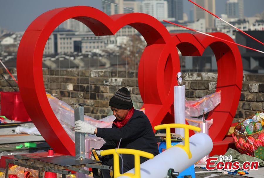 The Ming Dynasty (1368-1644) city wall in Nanjing City, Jiangsu Province is decorated ahead of the Spring Festival, China\'s Lunar New Year, Jan. 27, 2019. (Photo: China News Service/Yang Bo)