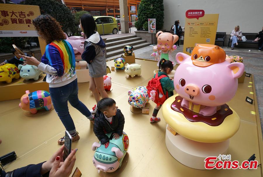 A piglet-themed art installment to promote the importance of saving money has been organized by the Hong Kong Deposit Protection Board and appears in an exhibition on Lee Tung Street in Hong Kong, Jan. 27, 2019. Hong Kong students and local artists designed 66 piglets for the exhibition. 2019 is the Year of the Pig. (Photo: China News Service/Zhang Wei)