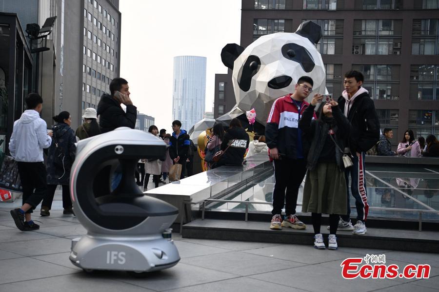 One of three robots patrols at the International Finance Square, a mega integrated complex comprising of high-end malls, office towers and serviced apartments, in Chengdu, Southwest China’s Sichuan Province, Jan. 28, 2019. (Photo: China News Service/Liu Zhongjun)