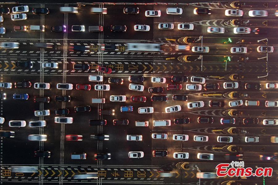 A drone photo shows heavy traffic on an expressway in Nanjing City, East China’s Jiangsu Province, Jan. 30, 2019. China is in the midst of its Spring Festival travel rush as millions of people go home for family reunions for the most important festival of the year. (Photo: China News Service/Yang Bo)