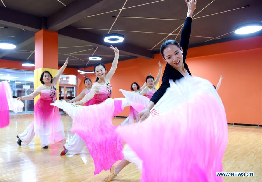 A dance instructor (1st R) and trainees practice dancing at a cultural center in Nanhe County, north China\'s Hebei Province, Jan. 30, 2019. More than 2000 people have participated in art training programs at a cultural center in Nanhe County as a way to enrich their life. (Xinhua/Zhu Xudong)
