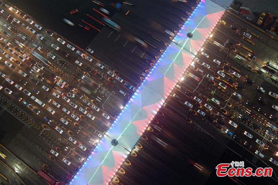 A drone photo shows heavy traffic on an expressway in Nanjing City, East China’s Jiangsu Province, Jan. 30, 2019. China is in the midst of its Spring Festival travel rush as millions of people go home for family reunions for the most important festival of the year. (Photo: China News Service/Yang Bo)