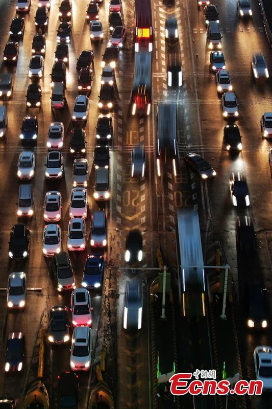 A drone photo shows heavy traffic on an expressway in Nanjing City, East China’s Jiangsu Province, Jan. 30, 2019. China is in the midst of its Spring Festival travel rush as millions of people go home for family reunions for the most important festival of the year. (Photo: China News Service/Yang Bo)