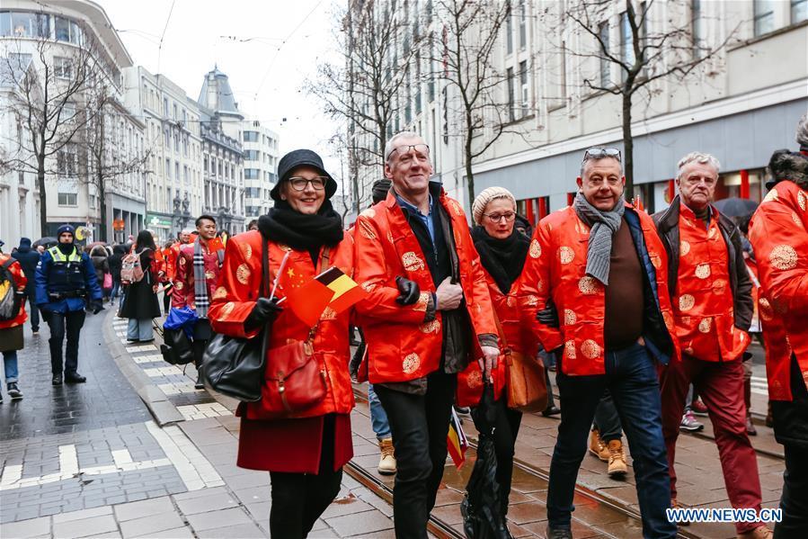 People take part in the 2019 Spring Festival parade in downtown Antwerp, Belgium, on Feb. 2, 2019. A long parade was held in the Belgian city of Antwerp on Saturday as part of the 2019 Spring Festival organized by the local Chinese community and Antwerp to mark the beginning of the Chinese New Year. (Xinhua/Zhang Cheng)