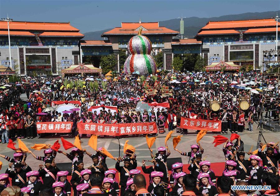 People attend Spring Festival celebration activities in Lancang Lahu Autonomous County in Pu\'er City, southwest China\'s Yunnan Province, Feb. 7, 2018. People of ethnic groups wearing their traditional festive costumes took part in a parade to celebrate the Chinese Lunar New Year in Lancang Lahu Autonomous County. (Xinhua/Yang Zongyou)