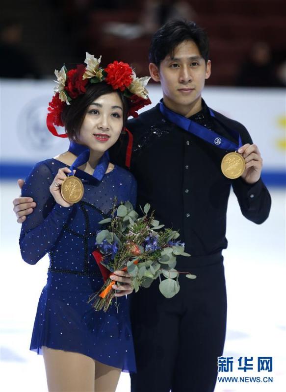 Sui Wenjing and Han Cong hold their gold medals after winning the pairs competition at the Four Continents Figure Skating Championships in Anaheim, U.S., on Feb. 9, 2019.  (Photo/Xinhua)