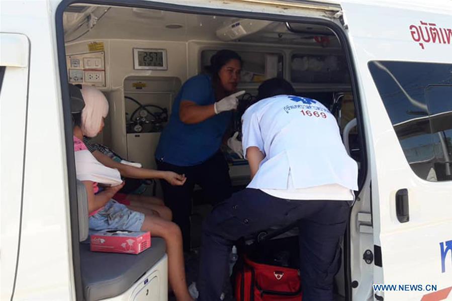 Rescuers help to treat tourists injured in the speedboat crash accident at the Phuket Island, Thailand, on Feb. 9, 2019. A total of 11 Chinese tourists and two crew members were injured after a tourist speedboat crashed with an oil barge near Thailand\'s southern Phuket Island on Saturday afternoon, the Chinese Consulate-General in the southern province of Songkhla confirmed on Sunday. (Xinhua)