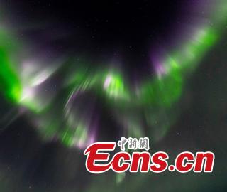 A photo taken in Abisko, Sweden shows the stunning northern lights look like a phoenix in the sky. (Photo/IC)