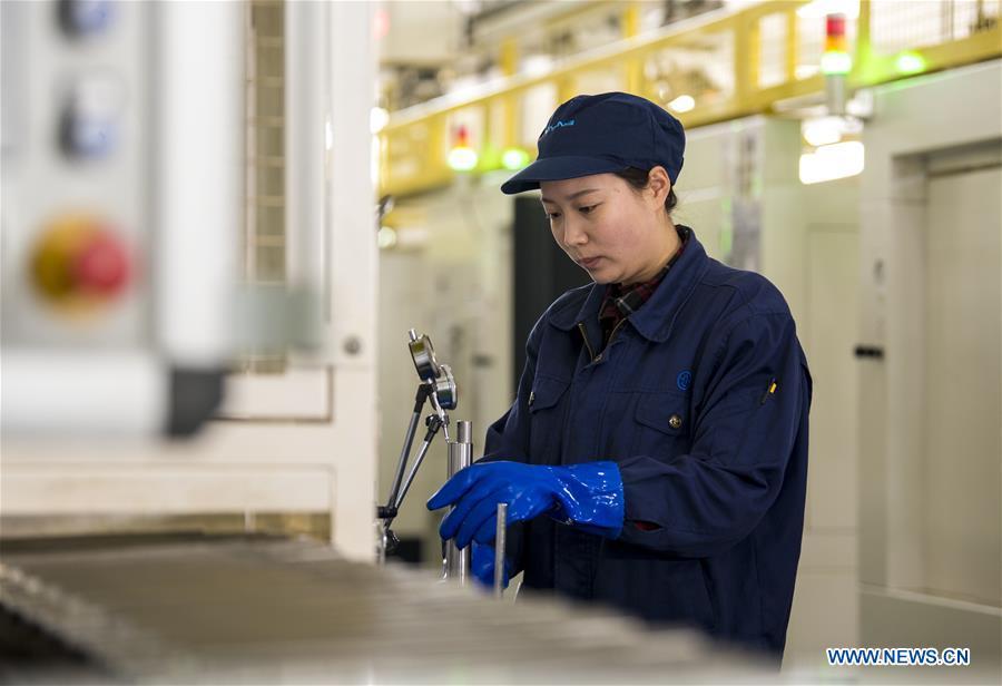 A worker is on duty at a company in Taizhou City, east China\'s Jiangsu Province, Feb. 11, 2019, the first workday after Spring Festival holiday. Millions of Chinese return to work as the week-long Spring Festival holiday ends. (Xinhua/Yang Yugang)
