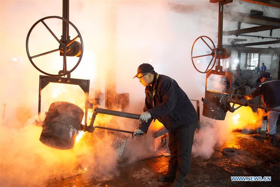 A worker is on duty at a machinery company in Hongze District of Huai\'an City, east China\'s Jiangsu Province, Feb. 11, 2019, the first workday after Spring Festival holiday. Millions of Chinese return to work as the week-long Spring Festival holiday ends. (Xinhua/Wan Zhen)