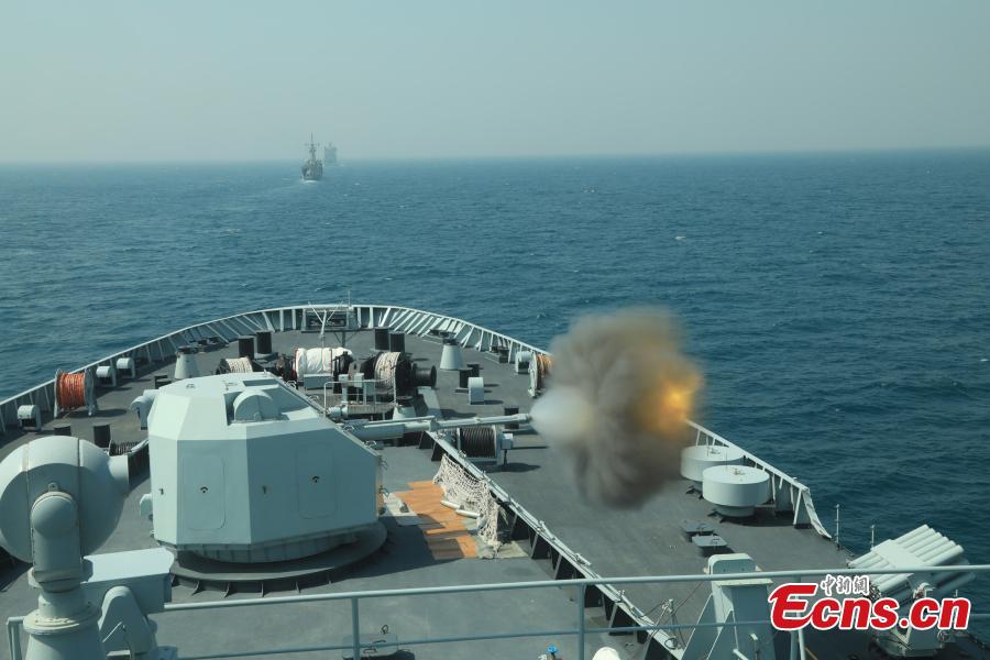 The PLA Navy ship Kunlun fires during the multinational military drill Peace-19 held in the waters off Karachi, Pakistan from Feb. 11 to 12. The drill undertook 23 programs including ship supply and maneuvers against a pirate attack (Photo: China News Service/Xue Chengqiang)