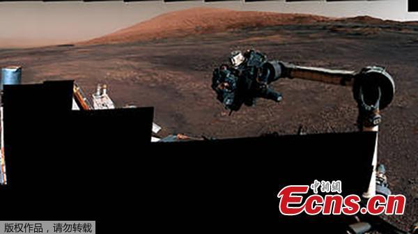 A panorama taken on December 19, 2018 by the Mast Camera (Mastcam) on NASA\'s Curiosity Mars rover. The rover\'s last drill location on Vera Rubin Ridge is visible, as well as the clay region it will spend the next year exploring. The scene combines 122 images taken with Mastcam\'s left-eye camera. (Photo/NASA)