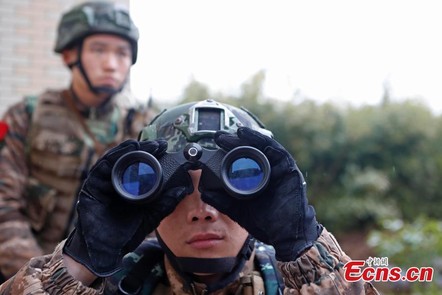 Members of the armed police take part in a drill simulating a hostage-taking scenario at Zhangjiang Hi-Tech Park in Pudong, Shanghai, February 12, 2019. The drill was organized to enhance emergency preparedness. (Photo: China News Service/Yin Liqin)
