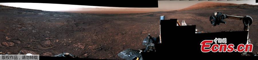 A panorama taken on December 19, 2018 by the Mast Camera (Mastcam) on NASA\'s Curiosity Mars rover. The rover\'s last drill location on Vera Rubin Ridge is visible, as well as the clay region it will spend the next year exploring. The scene combines 122 images taken with Mastcam\'s left-eye camera. (Photo/NASA)