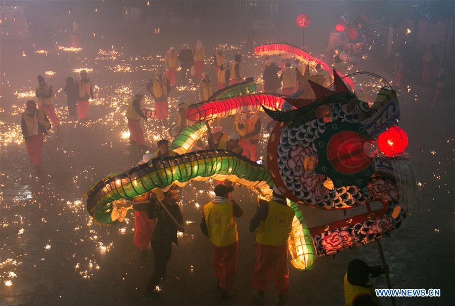 People perform dragon dance to celebrate the upcoming Lantern Festival, which falls on Feb. 19 this year, in Dafang County of Bijie City, southwest China\'s Guizhou Province, Feb. 13, 2019. (Xinhua/Luo Dafu)