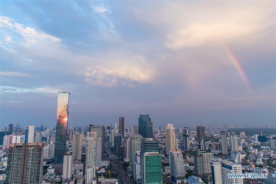 A rainbow appears in the sky after rainfall in Bangkok, Thailand, Feb. 17, 2019. The rainfall helped to improve the air quality in Bangkok. (Xinhua/Zhang Keren)