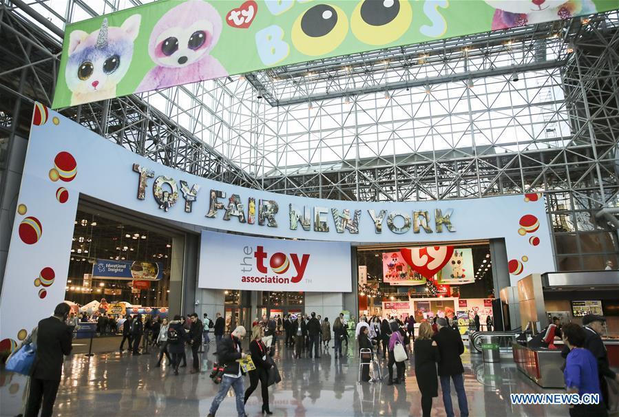 Visitors look around at the 116th Annual North American International Toy Fair at the Jacob K. Javits Convention Center in New York, the United States, Feb. 16, 2019. The toy fair, held from February 16 to 19 this year, gathered more than 1,000 toy exhibitors and hundreds of thousands of toys and youth entertainment products to retail outlets and trade guests from over 100 countries and regions. (Xinhua/Wang Ying)