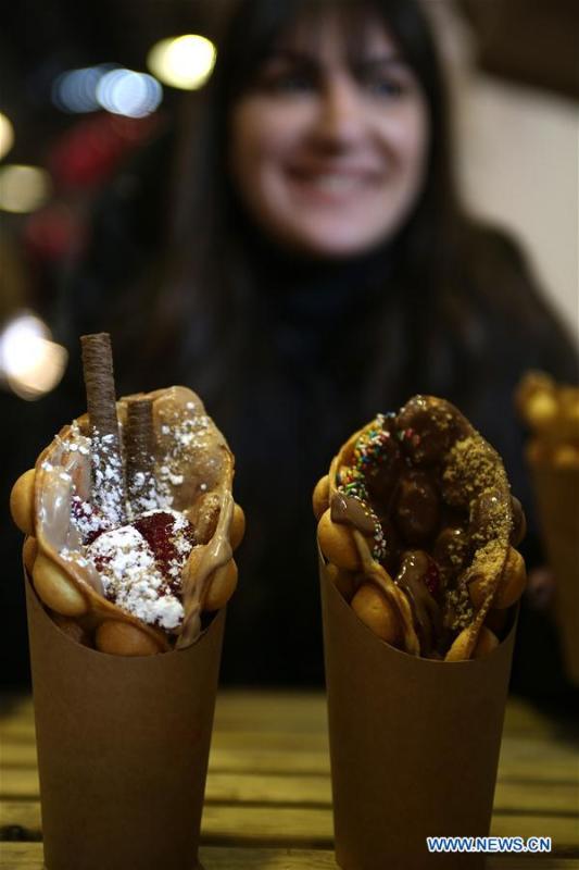 Chocolate sweets are sold during the Chocolate Festival in Athens, Greece, Feb. 16, 2019. The four-day festival, held from February 14 to 17, involved tasting sessions, workshops and children activities led by experts dedicated to the art of chocolate. (Xinhua/Marios Lolos)