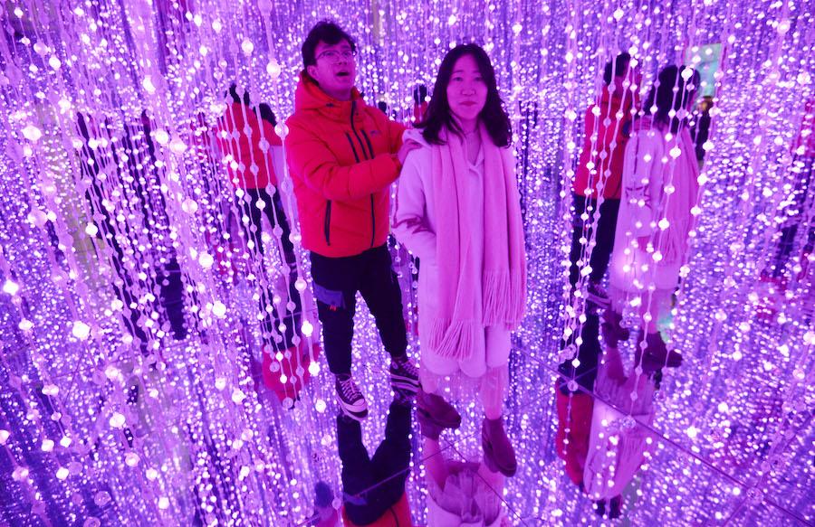 A couple visits the 3D immersive pavilion in Handan city, Hebei province, on Feb 14, 2019. (Photo by Hao Qunying/Asianewsphoto)