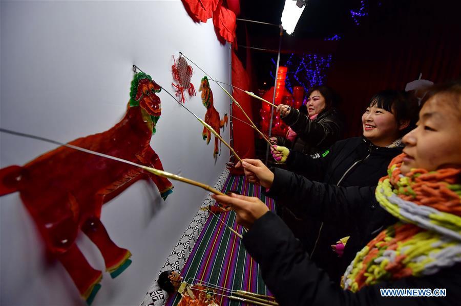 People experience shadow play at a lantern fair in the Nanhu Park in Tangshan, north China\'s Hebei Province, Feb. 15, 2019. (Xinhua/Yang Shiyao)