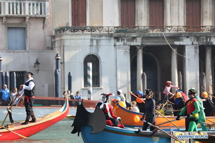 People participate in a water parade during the Venice Carnival in Venice, Italy, on Feb. 17, 2019. The Venice Carnival 2019 kicked off on Saturday and will last until March 5. (Xinhua/Cheng Tingting)