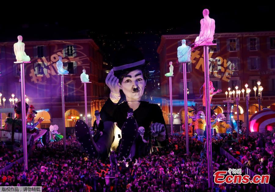 A float with a giant figure of Charlie Chaplin is paraded through the crowd during the 135th Carnival parade in Nice, France, Feb. 16, 2019. (Photo/Agencies)