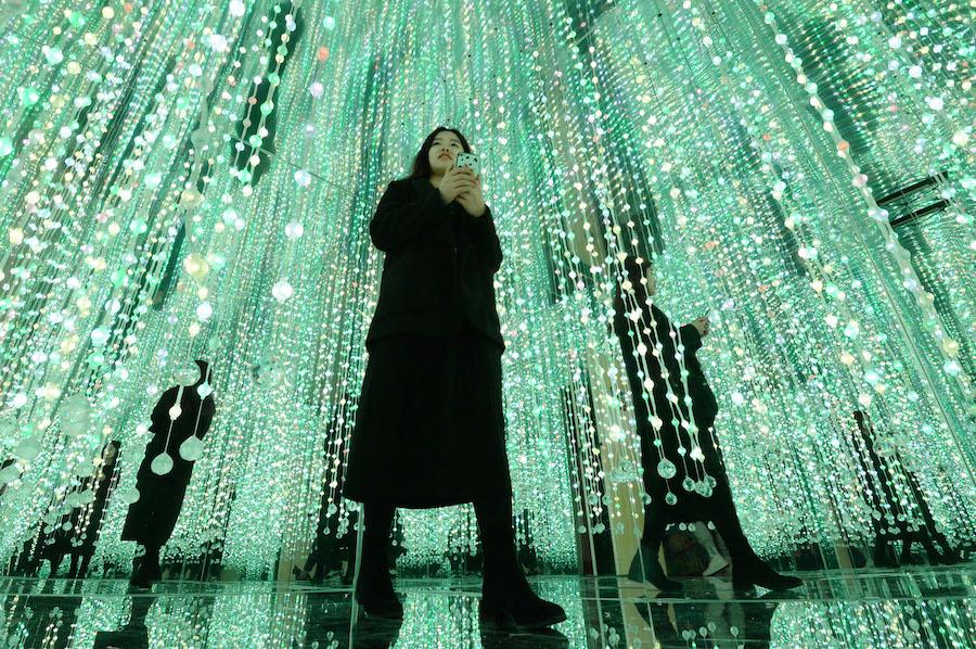 A woman takes photos at the 3D immersive pavilion in Handan city, Hebei province, on Feb 14, 2019. (Photo by Hao Qunying/Asianewsphoto)