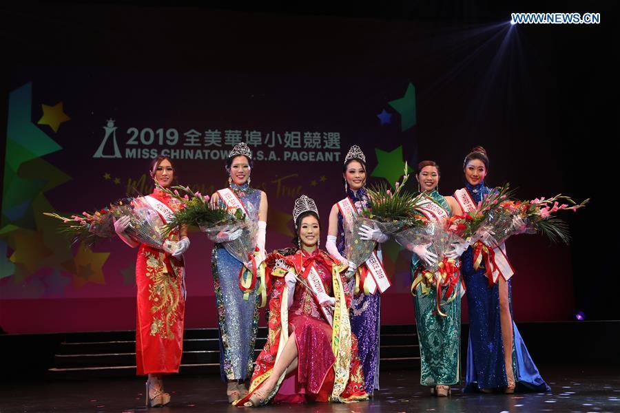 Prize winners pose for a group photo during the final of the 2019 Miss Chinatown U.S.A. Pageant in San Francisco, the United States, Feb. 16, 2019. A total of 12 contestants took part in the final competition organized by San Francisco Chinese Chamber of Commerce. (Xinhua/Liu Yilin)