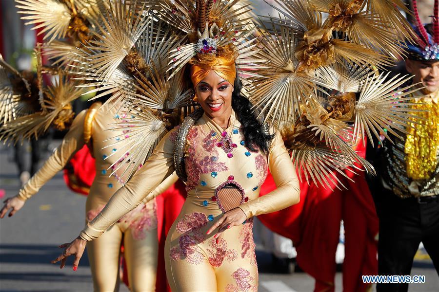 Performers take part in a parade of Nice Carnival with the theme \