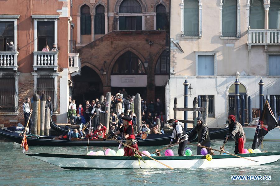 People participate in a water parade during the Venice Carnival in Venice, Italy, on Feb. 17, 2019. The Venice Carnival 2019 kicked off on Saturday and will last until March 5. (Xinhua/Cheng Tingting)