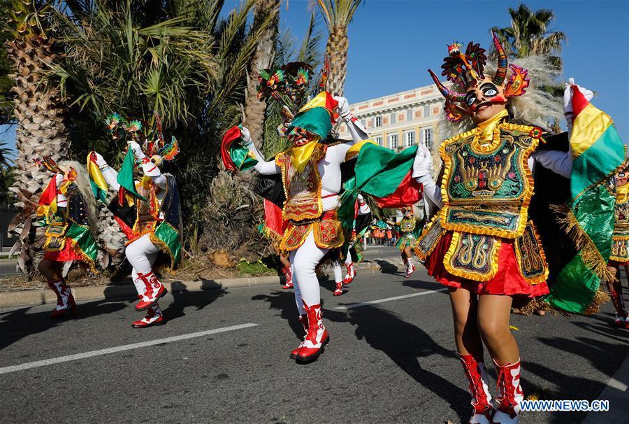 Performers take part in a parade of Nice Carnival with the theme \