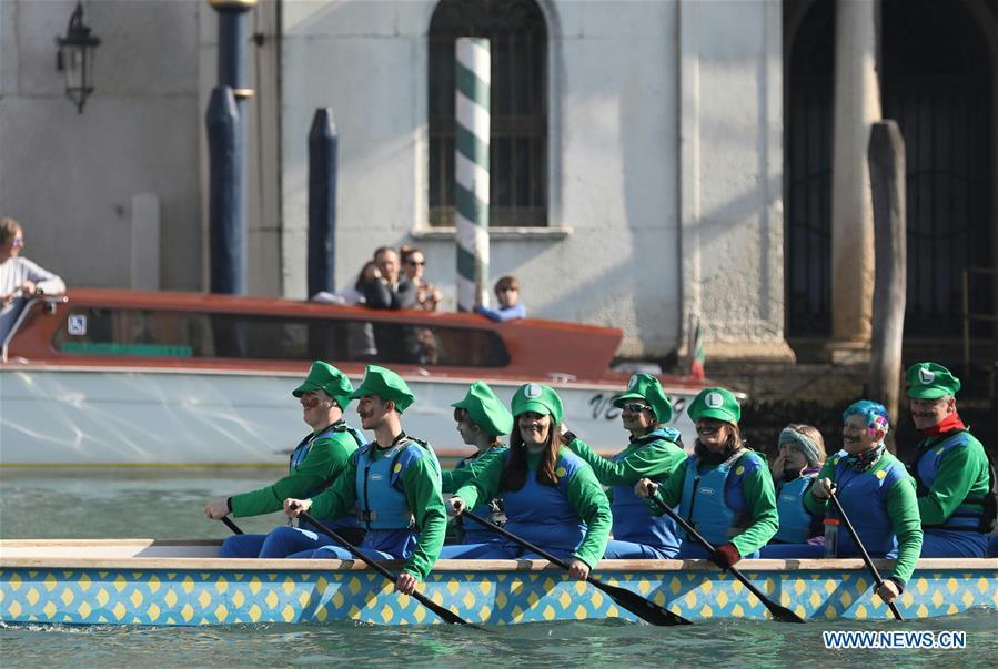People participate in a water parade during the Venice Carnival in Venice, Italy, on Feb. 17, 2019. The Venice Carnival 2019 kicked off on Saturday and will last until March 5. (Xinhua/Cheng Tingting)