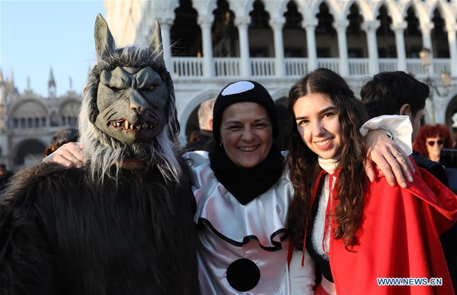 Revelers pose during the Venice Carnival in Venice, Italy, on Feb. 17, 2019. The Venice Carnival 2019 kicked off on Saturday and will last until March 5. (Xinhua/Cheng Tingting)