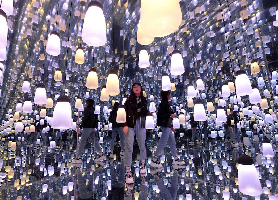 A woman visits a 3D immersive pavilion in Handan city, North China’s Hebei province, on Feb 14, 2019. The pavilion unveils immersive interactive scenes with themes such as “Infinite Stars”, “Crystal Love” and “Living Forest”, creating a colorful and dreamlike world that leaves an impression with visitors. (Photo by Hao Qunying/Asianewsphoto)
