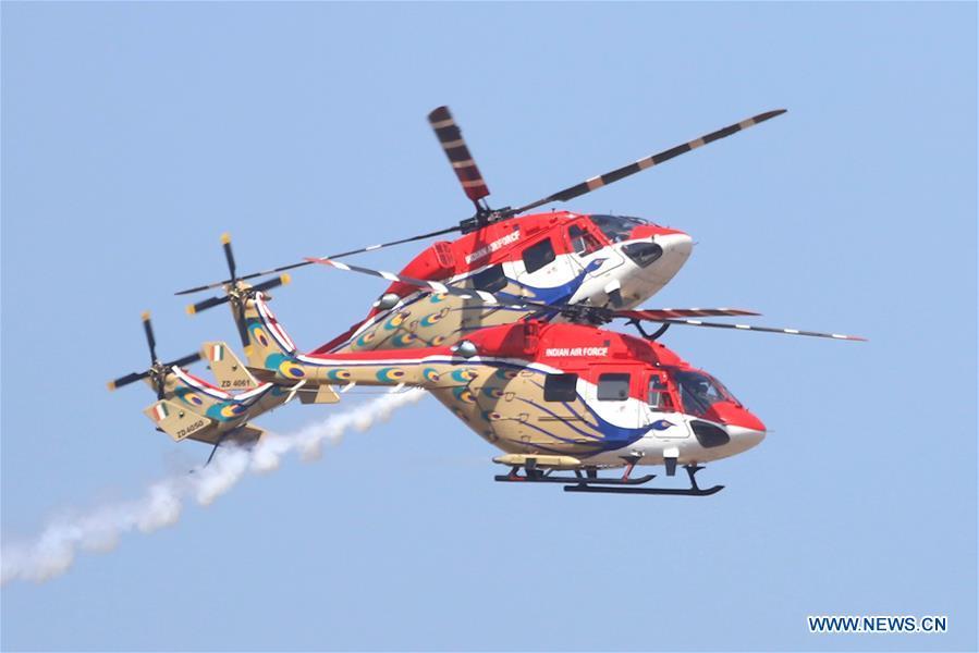 Indian Air Force Dhruv helicopters attend the Aero India Show 2019 rehearsal over the Yelahanka air base in Bangalore, India, on Feb. 18, 2019. The five-day Aero India Show 2019 will start on Feb. 20. (Xinhua)