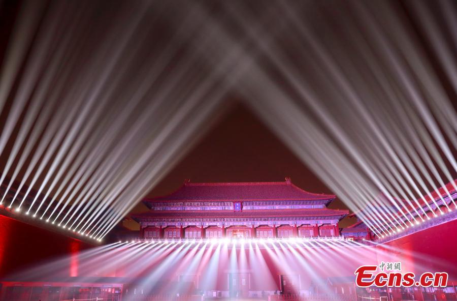 Employees adjust lights at the Palace Museum, Feb. 18, 2019. Tuesday marks the traditional Chinese Lantern Festival. To celebrate the festival, the Palace Museum opens to the public at night for the first time in 94 years. The celebration features a red lantern show, light projection for renowned ancient paintings as well as New Year-themed exhibitions inside the grand palace cluster.  (Photo: China News Service/Du Yang)