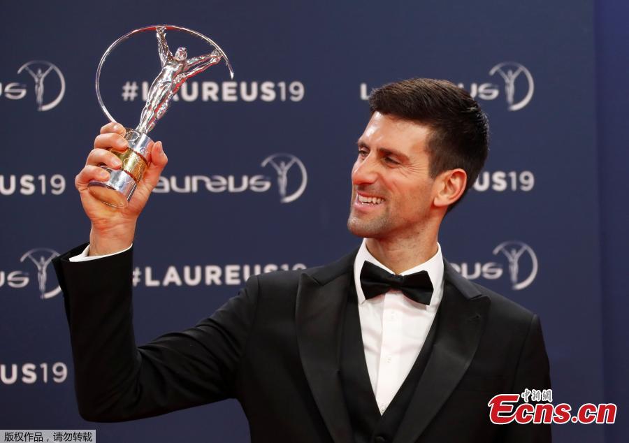 Tennis star Novak Djokovic poses after winning the Sportsman of the Year award at Laureus World Sports Awards in Salle des Etoiles, Monaco, Feb. 18, 2019. (Photo/Agencies)