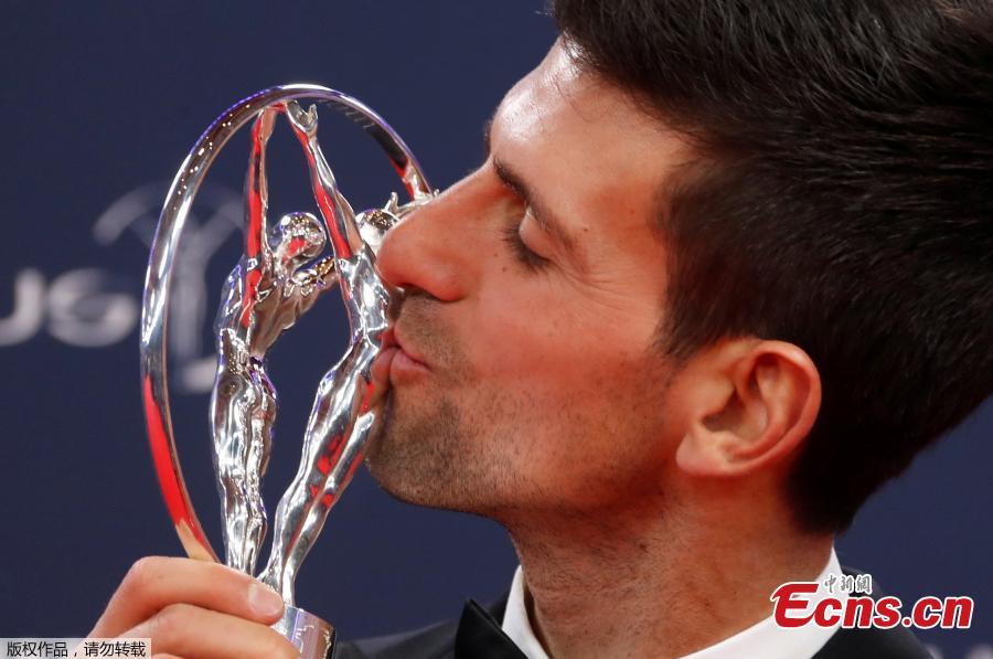Tennis star Novak Djokovic poses after winning the Sportsman of the Year award at Laureus World Sports Awards in Salle des Etoiles, Monaco, Feb. 18, 2019. (Photo/Agencies)