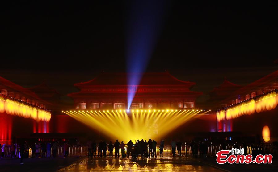 Employees adjust lights at the Palace Museum, Feb. 18, 2019. Tuesday marks the traditional Chinese Lantern Festival. To celebrate the festival, the Palace Museum opens to the public at night for the first time in 94 years. The celebration features a red lantern show, light projection for renowned ancient paintings as well as New Year-themed exhibitions inside the grand palace cluster.  (Photo: China News Service/Du Yang)