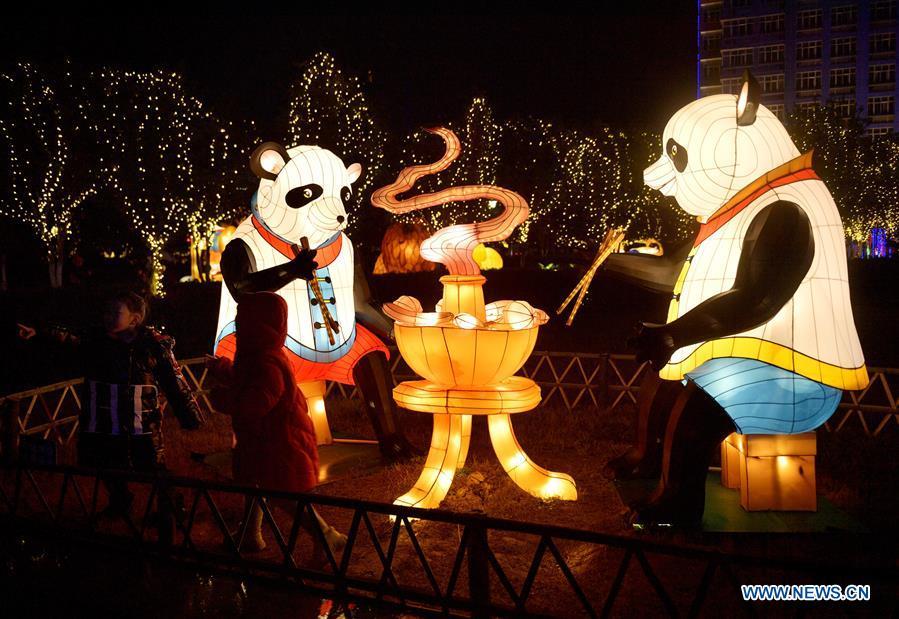 Photo taken on Feb. 17, 2019 shows panda-themed lanterns near the Gongshui River in Xuan\'en County of Enshi Tujia and Miao Autonomous Prefecture, central China\'s Hubei Province. With the approaching of the Lantern Festival, many places across the country are decorated by colorful lanterns. (Xinhua/Song Wen)