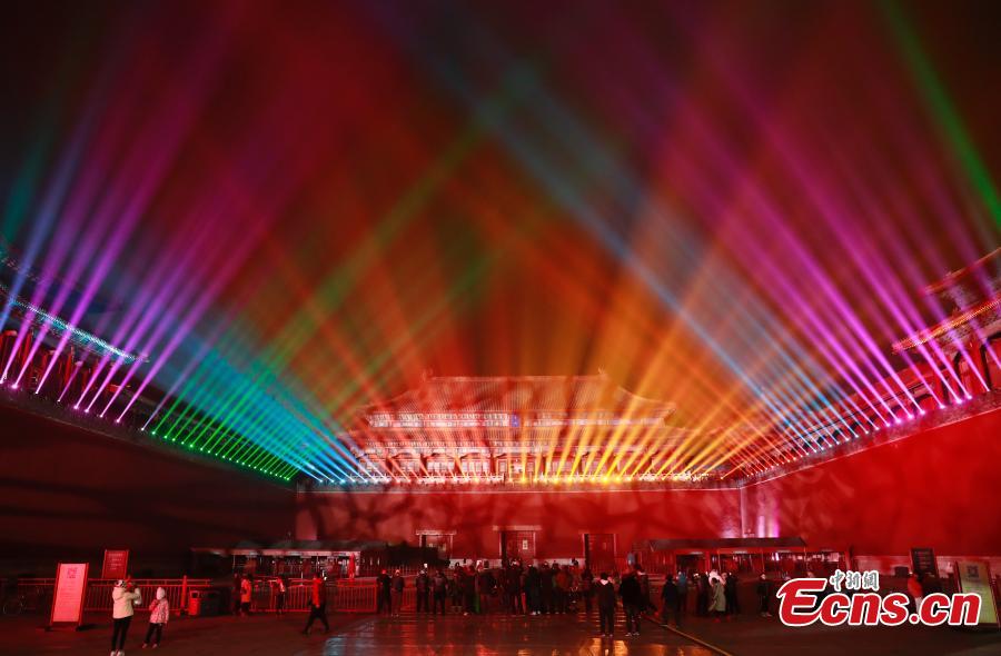 Employees adjust lights at the Palace Museum, Feb. 18, 2019. Tuesday marks the traditional Chinese Lantern Festival. To celebrate the festival, the Palace Museum opens to the public at night for the first time in 94 years. The celebration features a red lantern show, light projection for renowned ancient paintings as well as New Year-themed exhibitions inside the grand palace cluster.  (Photo: China News Service/Du Yang)