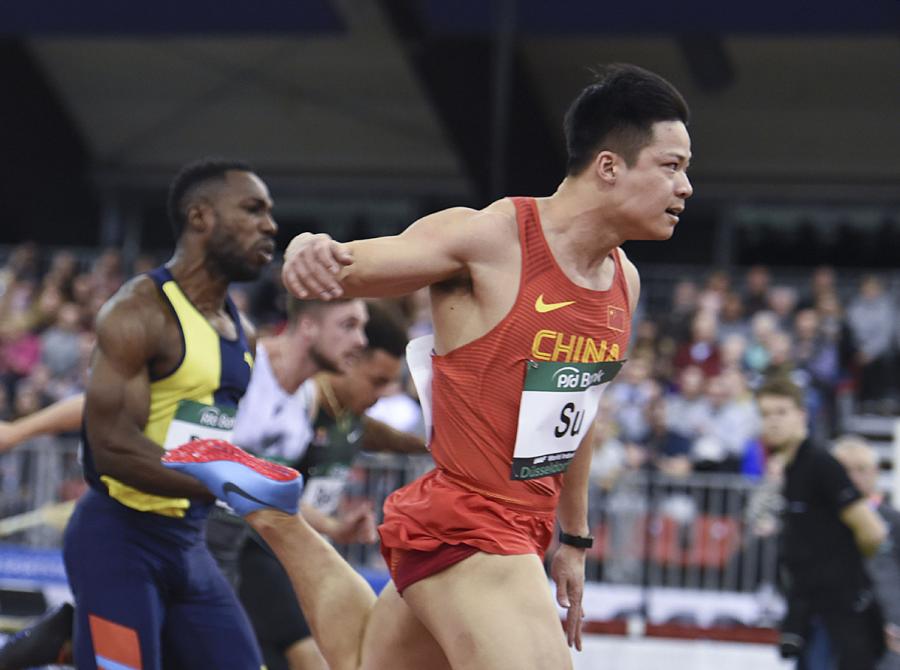 China\'s Su Bingtian crosses the finish line during the men\'s 60 meters in Dusseldorf, Germany, on Feb. 21, 2019. (Photo/Xinhua)
