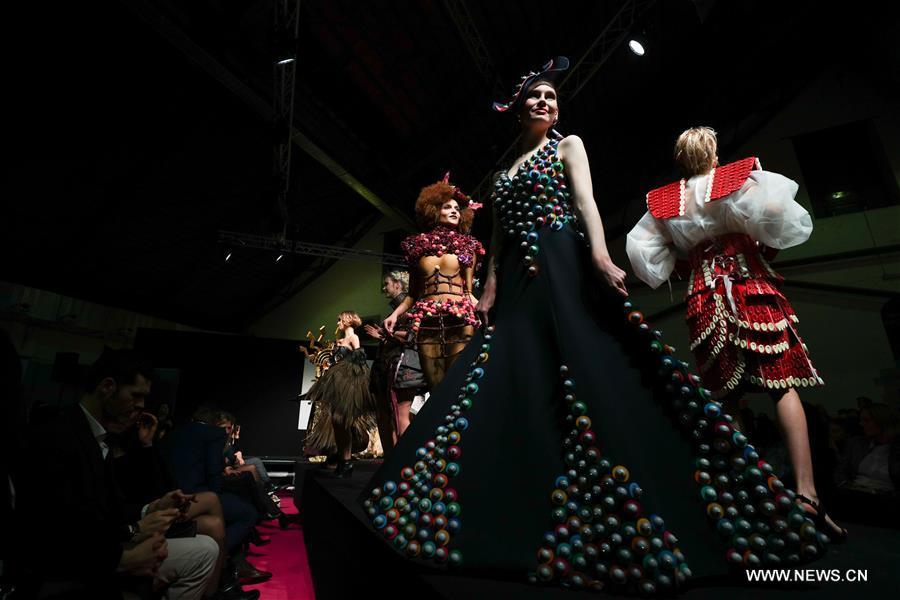 Models display chocolate dresses during the opening show of the 6th Brussels Chocolate Salon in Brussels, Belgium, Feb. 21, 2019. The 6th Brussels Chocolate Salon (Salon du Chocolat Brussels) kicked off here on Thursday. In the following three days, 130 chocolatiers, pastry chefs, confectioners, designers and cocoa experts of international reputation in attendance will share and exhibit chocolate in all its delectable forms. (Xinhua/Zheng Huansong)