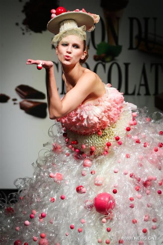 A model displays a chocolate dress during the opening show of the 6th Brussels Chocolate Salon in Brussels, Belgium, Feb. 21, 2019. The 6th Brussels Chocolate Salon (Salon du Chocolat Brussels) kicked off here on Thursday. In the following three days, 130 chocolatiers, pastry chefs, confectioners, designers and cocoa experts of international reputation in attendance will share and exhibit chocolate in all its delectable forms. (Xinhua/Zheng Huansong)