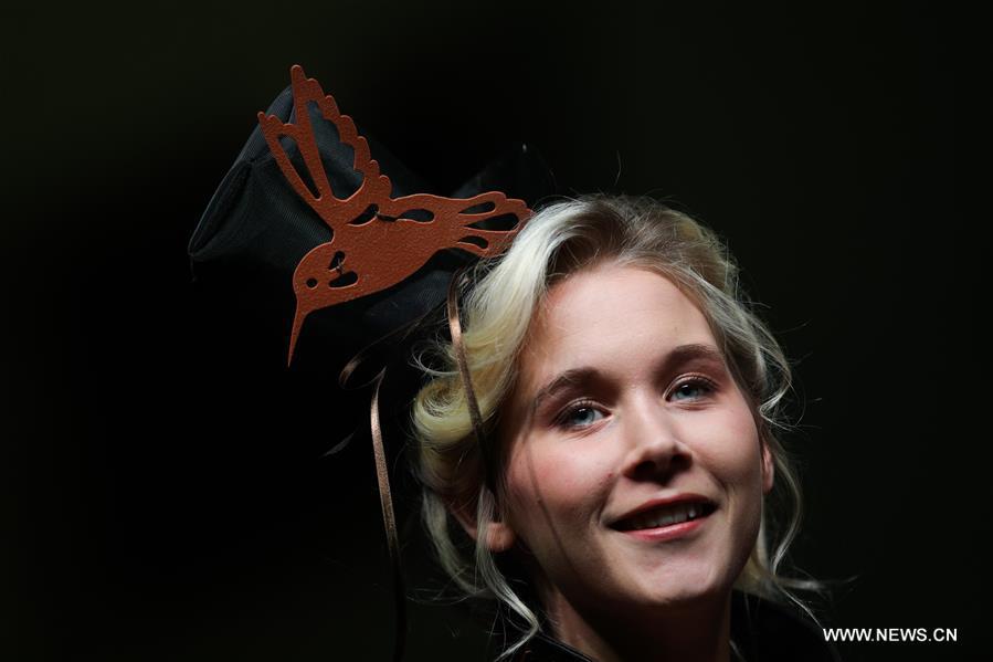 A model wears a chocolate headdress during the opening show of the 6th Brussels Chocolate Salon in Brussels, Belgium, Feb. 21, 2019. The 6th Brussels Chocolate Salon (Salon du Chocolat Brussels) kicked off here on Thursday. In the following three days, 130 chocolatiers, pastry chefs, confectioners, designers and cocoa experts of international reputation in attendance will share and exhibit chocolate in all its delectable forms. (Xinhua/Zheng Huansong)