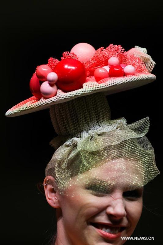 A model wears a chocolate headdress during the opening show of the 6th Brussels Chocolate Salon in Brussels, Belgium, Feb. 21, 2019. The 6th Brussels Chocolate Salon (Salon du Chocolat Brussels) kicked off here on Thursday. In the following three days, 130 chocolatiers, pastry chefs, confectioners, designers and cocoa experts of international reputation in attendance will share and exhibit chocolate in all its delectable forms. (Xinhua/Zheng Huansong)