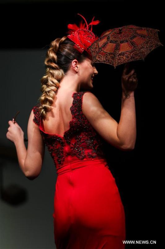 A model attends the opening show of the 6th Brussels Chocolate Salon in Brussels, Belgium, Feb. 21, 2019. The 6th Brussels Chocolate Salon (Salon du Chocolat Brussels) kicked off here on Thursday. In the following three days, 130 chocolatiers, pastry chefs, confectioners, designers and cocoa experts of international reputation in attendance will share and exhibit chocolate in all its delectable forms. (Xinhua/Zheng Huansong)