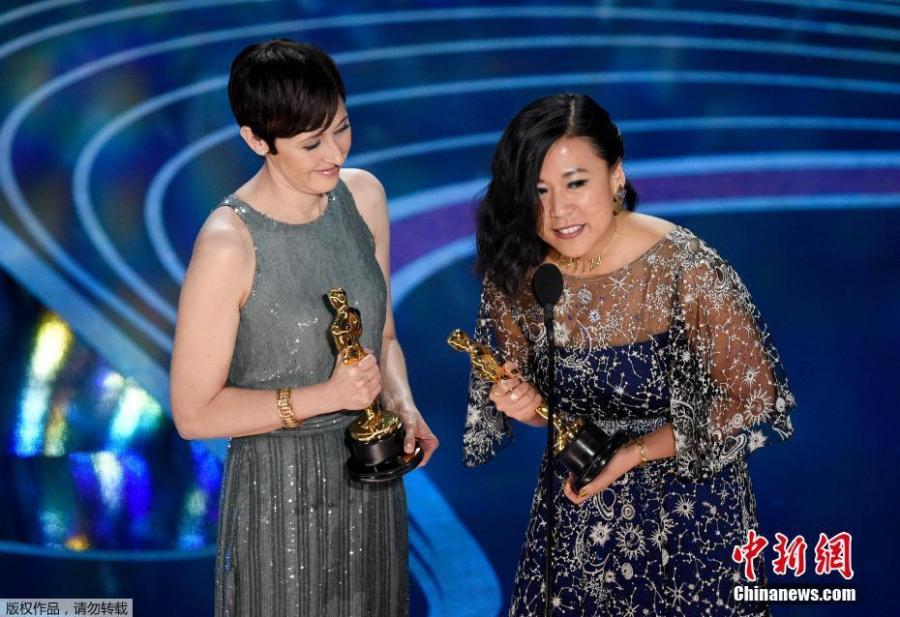Becky Neiman-Cobb and Domee Shi (right) accept the Short Film (Animated) award for Bao onstage during the 91st Annual Academy Awards at Dolby Theatre on Feb. 24, 2019 in Hollywood, California.  (Photo/Agencies)